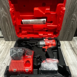 MILWAUKEE 1/2" IMPACT W/TWO BATTERIES AND CHARGER
