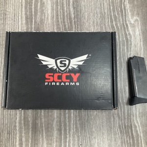 SCCY CPX-2 9MM WITH RED DOT AND EXTRA MAG IN BOX