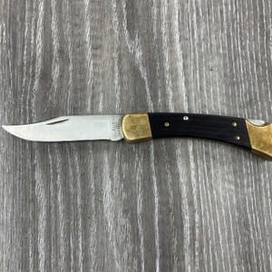 BUCK 110 WITH LEATHER SHEATH