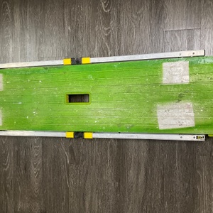 GORILLA LADDERS WORK PLATFORM HAS GREEN SPRAY PAINT ON IT